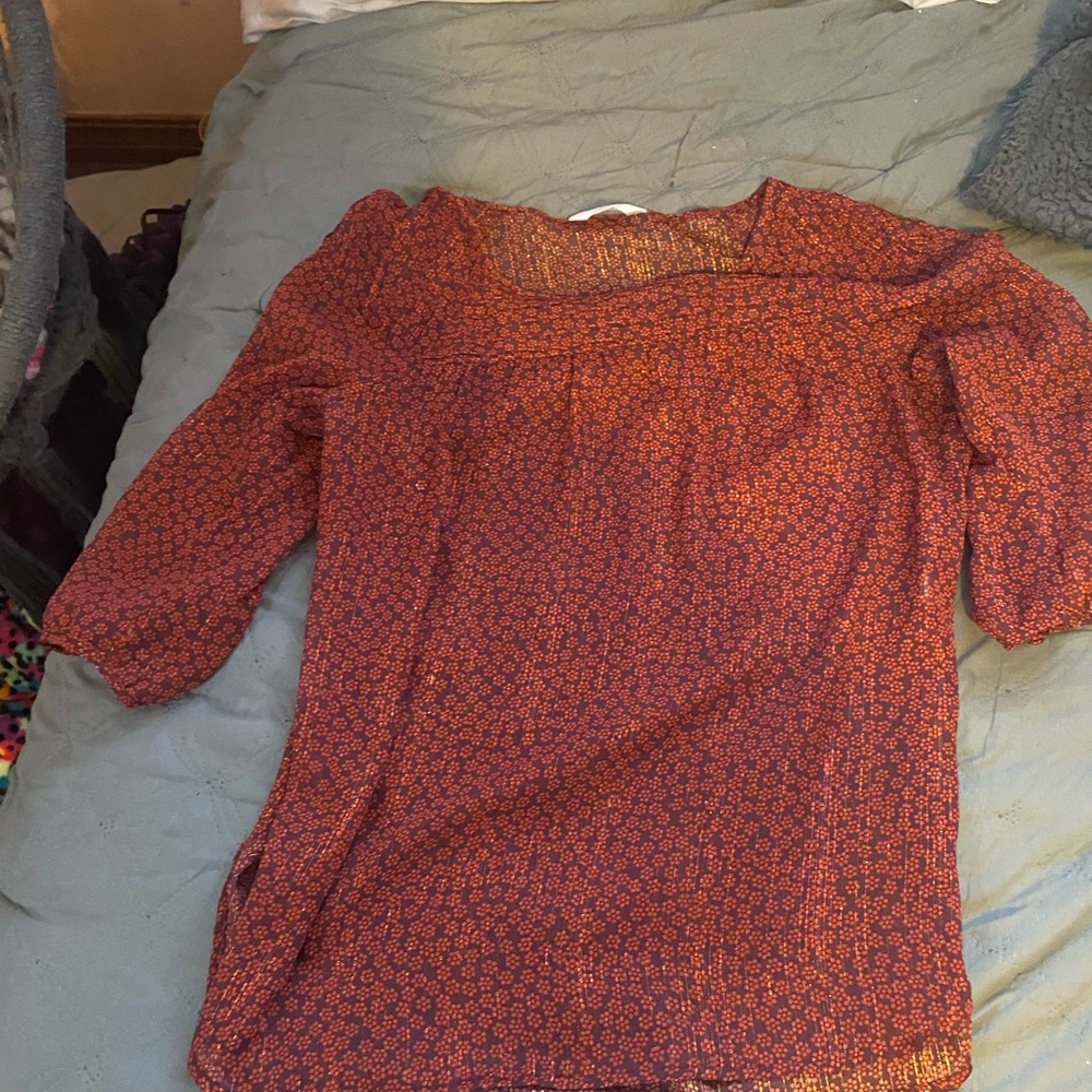 Red and gold blouse